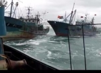 韩国海警发射453发子弹警告中国渔船 扣押20名船员